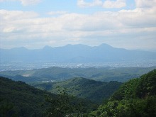 盛岡市上米内字土室　国道455号から見る紫波三山と盛岡市街の景観